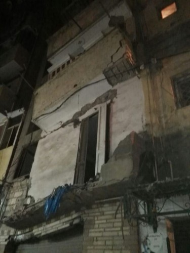 بالصور.. انهيار جزئي فى عقار مأهول بالسكان بحي وسط فى الاسكندرية
