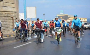 بالصور وزير الرياضة يقود ماراثون الدراجات بكورنيش الإسكندرية