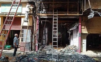 انهيار جزئي لسلم عقار قديم بالاسكندرية اثر اندلاع حريق هائل باحد المحلات