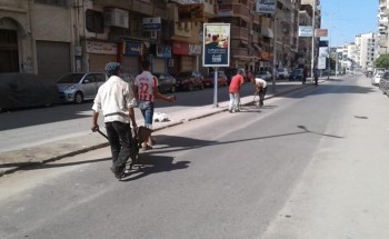 حملات تجريف رمال وكنس بشوارع دمياط لرفع مستوى المظهر العام