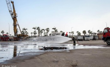 مناورة مكافحة حريق بساحة الأبلاكاش بميناء دمياط