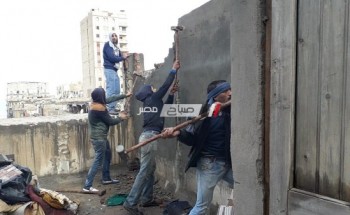 بالصور تنفيذ 5 قرارات إزالة عقارات مخالفة بحى وسط بالأسكندرية