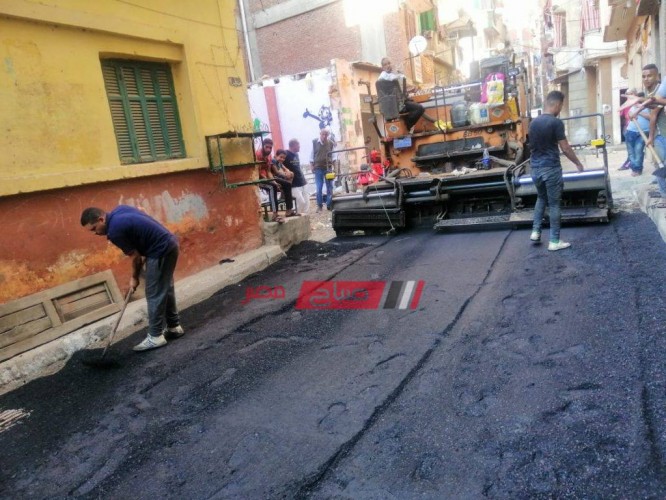 بالصور رصف وسفلتة شوارع في حي الجمرك الإسكندرية