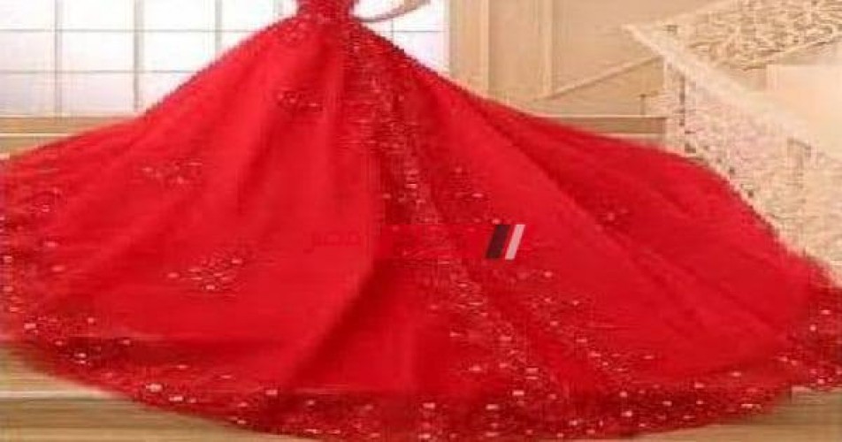 تفسير حلم الفستان الأحمر في المنام للعزباء والمتزوجة