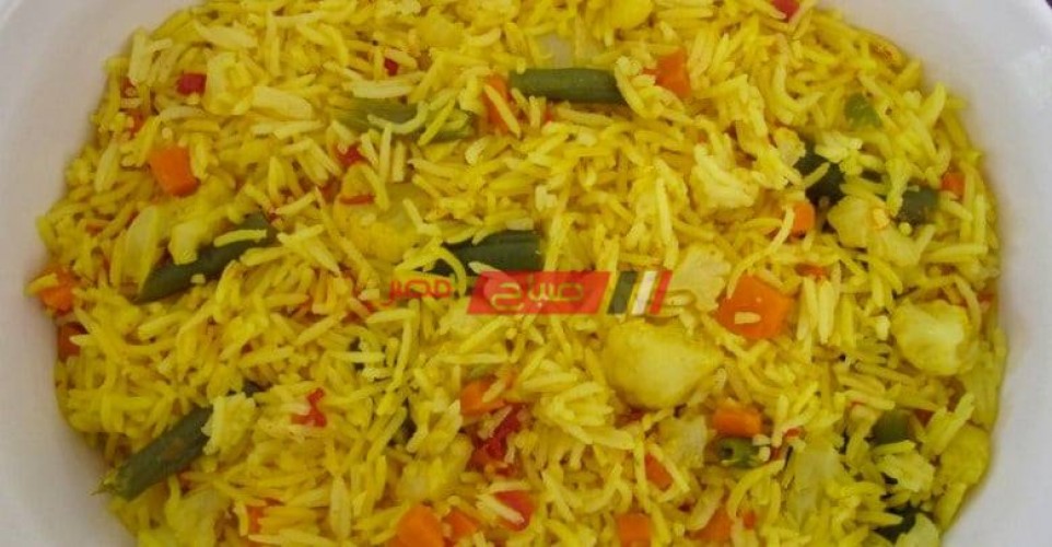 طريقة عمل الأرز الأصفر بالكارى والفلفل الألوان فى نصف ساعة على طريقة الشيف فاطمة ابو حاتى
