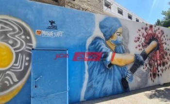 بأيدي فناني دمياط .. “رسم جرافيتي” على سور معهد الأورام لدعم الجيش الأبيض