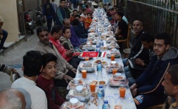 بالصور تنظيم أطول مائدة إفطار جماعي في دمياط
