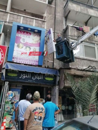 تكثيف حملات إزالة الإعلانات الغير مرخصة بأحياء الإسكندرية